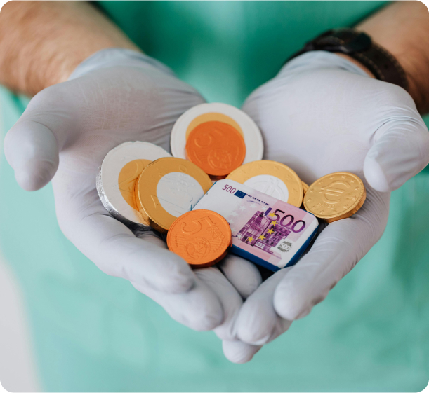 a medical person showing both hands with money in it